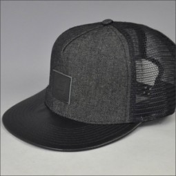 fashion leather brim trucker mesh hat/cap with leather patch