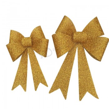 大きな金色のキラキラ輝く飾りの弓がクリスマスツリーのために導かれ (Cbb-1119) あなたのロゴで