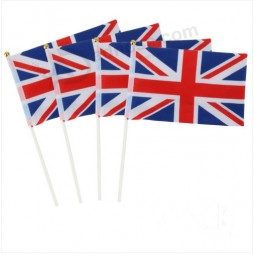 A Mão britânica do Jaque de união que acena a bandeira reaEu JubiEueu BRITÂNICO gb grande Grâ Bretanha eMbandeira