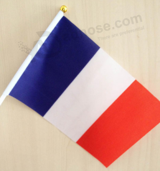 La bandera de mano al por mayor de la fábrica señala a mano la bandera de Francia