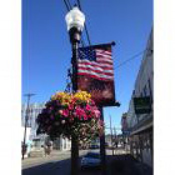 Pólo de iluminação de rua personalizado barato banner nos bandeira pólo de rua bandeira atacado