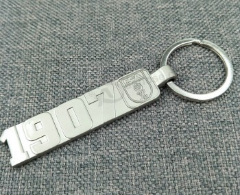 Barato personalizado em forma de logotipo em relevo anel chave atacado