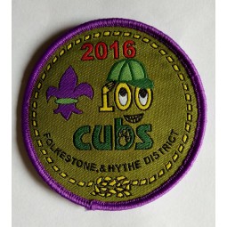 Factory direct wholesale customized top quality Purple Overlocking Round Clothing Woven Badge