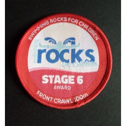 Factory direct wholesale customized top quality Rocks Design Red Overlocking Woven Badge