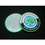 Factory direct wholesale customized top quality Round Shape Green Merrowed Border Woven Badge