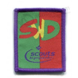 Factory direct wholesale customized top quality Purple Overlocking Border Garment Woven Patches