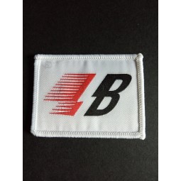 Wholesale customized high-end Ovelocking White Clothing Woven Badge