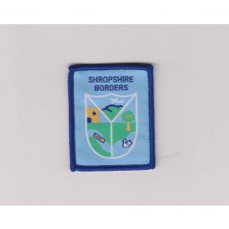 Wholesale customized high-end Customized Blue Overlocking Clothing Woven Badge