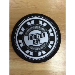 Wholesale customized high-end Round Shape Black Overlocking Woven Badge