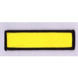 Wholesale customized high-end Yellow Bar Shape Design Black Overlocking Woven Badge