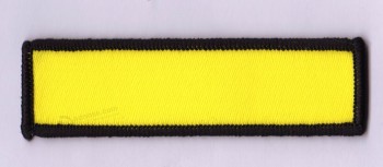 Wholesale customized high-end Yellow Bar Shape Design Black Overlocking Woven Badge