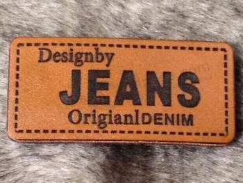 Ropa de moda al por mayor etiqueta de cuero jeans al por mayor