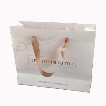 工厂定制纸质购物袋，用于购物和包装批发