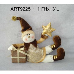All'ingrosso felice regalo di Natale pupazzo di neve con regalo e stella