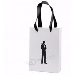 Custom printed white paper shopping bags with your own logo,CMYK printed art paper paper bag bag with rope handle wholesale