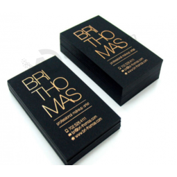 Black paper gold foil business card with custom logo
