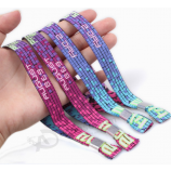 Disposable event decorated fabric wrist bands for one time use