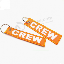 Etiqueta de la tripulación de vuelo de la tela de muestras gratis etiqueta de la llave de logotipo personalizado