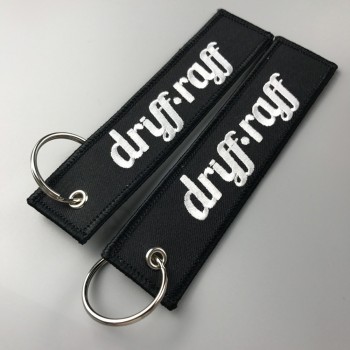 Newest custom fashion cheap embroidery woven keychain with your logo