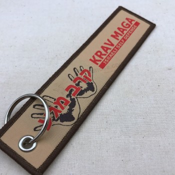 Custom color warning embroidery fabric keychain,personalized design ribbon keychains woven keychain