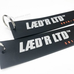 High quality custom brand logo keychain, cheap advertising bag rubber key chains with your logo