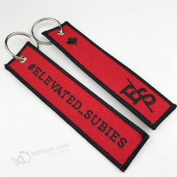 Custom cheap double sides logo embroidered woven keychain high quality personalised keyrings