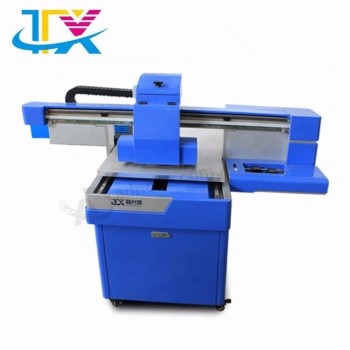O preço de impressora uv do leito do tamanho do a2 uv cobre a máquina de impressão móvel