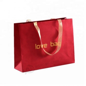 Gros cadeaux de fête personnalisés pas cher gros emballage des sacs en papier cadeau personnalisé pour le mariage