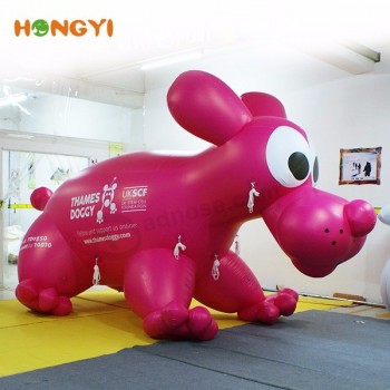 Modelo inflável cor-de-rosa do zodíaco do cão que anuncia o balão animal do cão dos desenhos animados