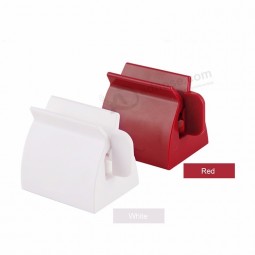 Multifuncional manual girar espremedor de pasta de dente de plástico dispensador de banho acessórios do banheiro conjuntos de produtos