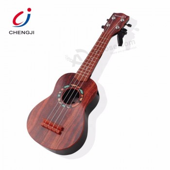 Alta qualidade adorável presente musical instrumento guitarra garoto brinquedo ukulele