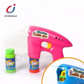 Popular outdoor cartoon blowing battery operated plastic flash bubble gun