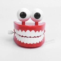 2018 Popular Red Plastic Big Eye Design Wind Up Mouth Toy Jumping Teeth Novelty Toy For Kids & Adult