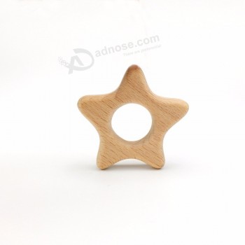 Jouet de dentition en bois naturel pour bébé en forme d'étoile