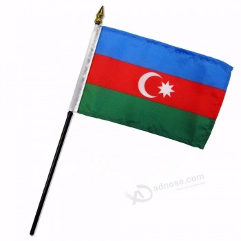 country azerbaijan national hand waving flag with stick