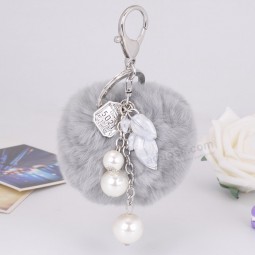 Fashion Fluffy Rabbit Fur Ball cute keychains Alloy Tag Small Leaf Pearl Key Rings Women Handbag Charm Pendent Fur Pom Pom Key Chains