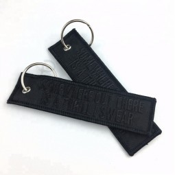custom jet fabric key tag/ embroidery keychain with china factory