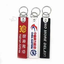 custom high quality text embroidery fabric keychain keytag