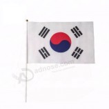 north korea country and japanese hand held  stick polyester flag with wood pole