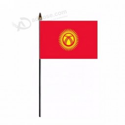 China factory supply 20*30cm celebrate Kyrgyzstan hand held flag
