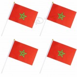 bandiera tenuta in mano all'ingrosso del Marocco con l'asta di plastica per l'allegria della tazza di mondo