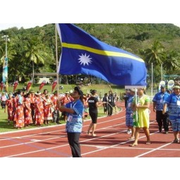 Nauru flag held high by 15 year old weightlifter