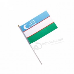 Different countries hand flag uzbekistan hand waving flag