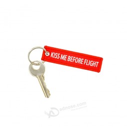 1piece size7.7*2cm Key chains KISS ME BEFORE FLIGHT for Aviation tag Woven label Keychain car