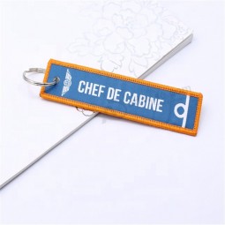 factory direct custom flight embroidery keychain woven key tag with your own logo