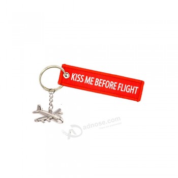 print KISS ME BEFORE FLIGHT CREW Embroidered key tag