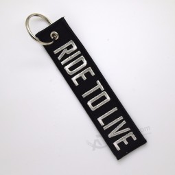 Wholesale custom embroidery twill pilot cool keychains tag