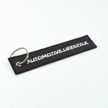 black embroidery key tag with white embroidery logo