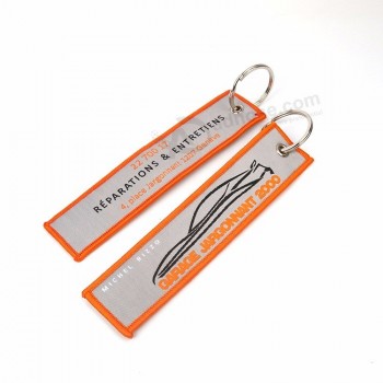 橙色merrow边框双面名称徽标织物标签平纹编织汽车钥匙扣