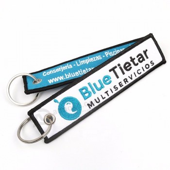 llaveros personalizados con logotipo de seguridad azul bordado de tela llaveros para colecciones